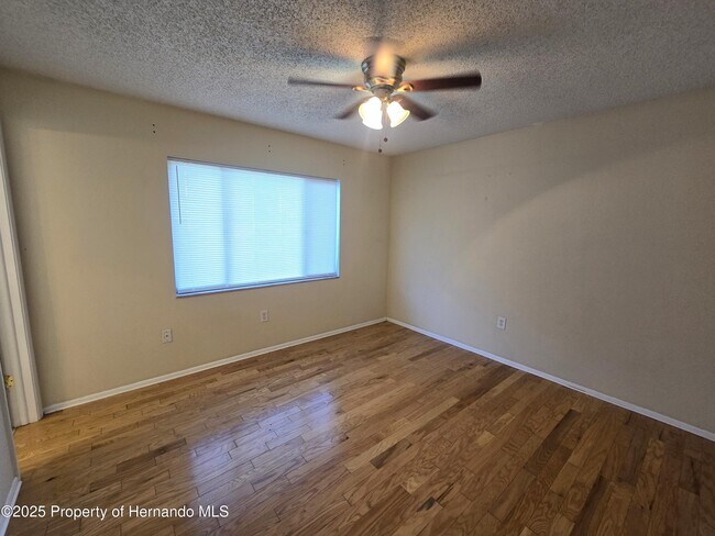 Building Photo - 8915 Woodmill Dr