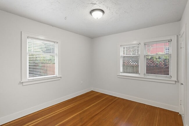 Building Photo - Charming Bungalow with Spacious Loft Suite and Large Backyard