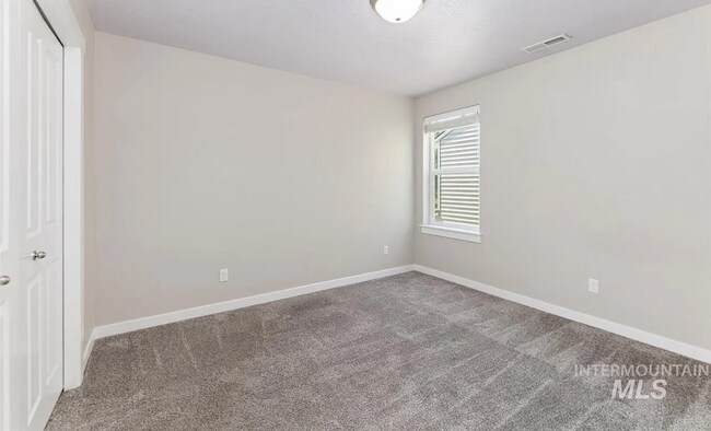 Building Photo - Stunning 4-Bedroom Home with Privacy & Low-Maintenance Living in Verado