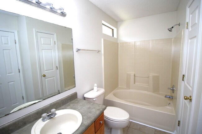 Building Photo - 3BR/2BA North Pensacola Brick Home with Bonus Room, Vaulted Ceilings & Privacy-Fenced Backyard Ne...