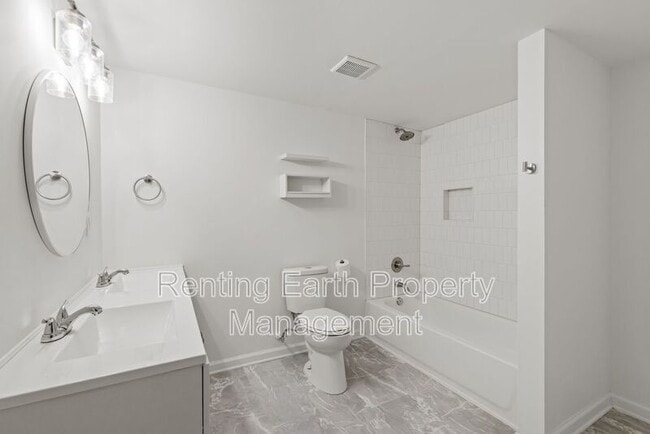 Building Photo - 714 85th St S