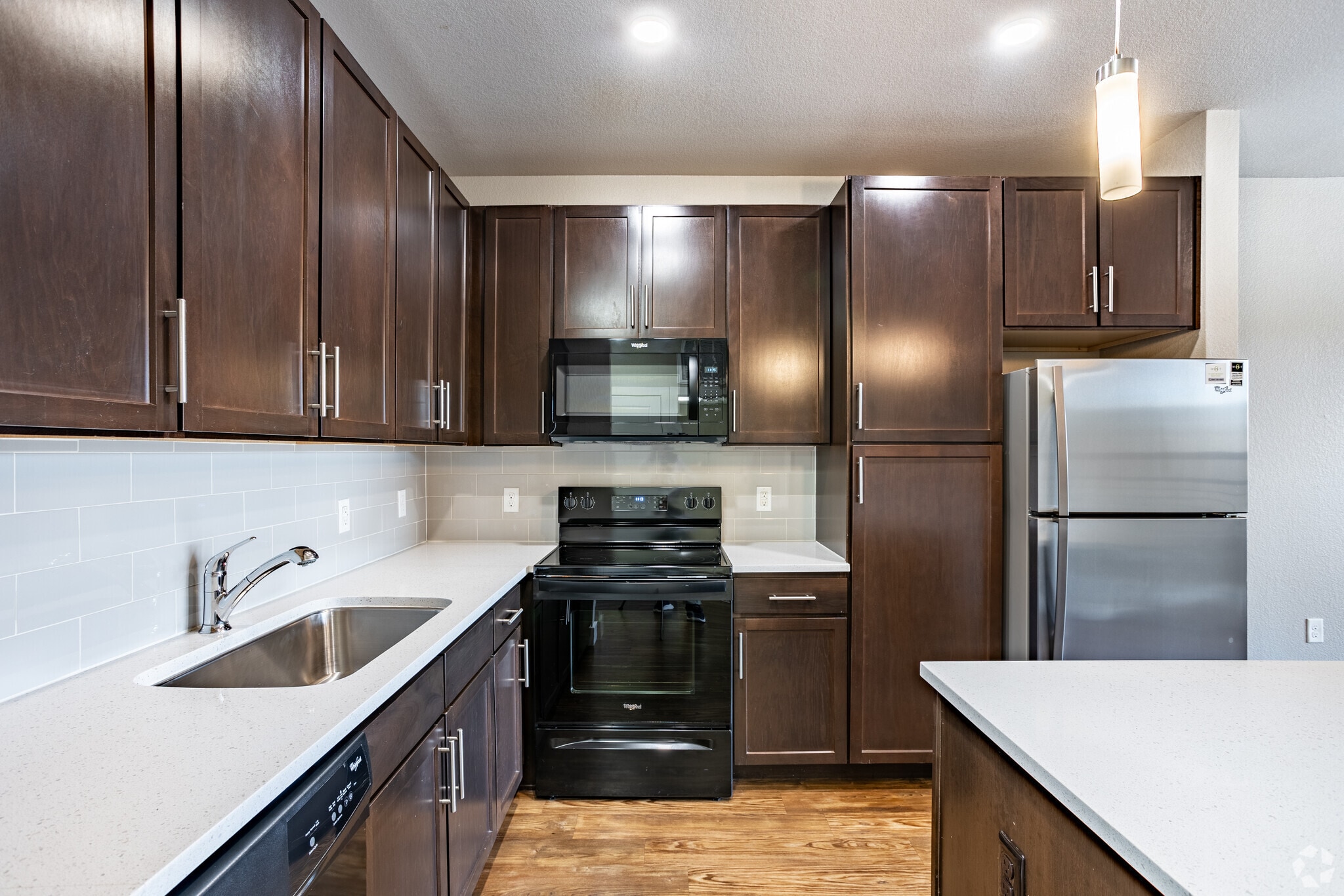 1BR, 1BA - 690SF - Jade - Kitchen - Basecamp at West 8th