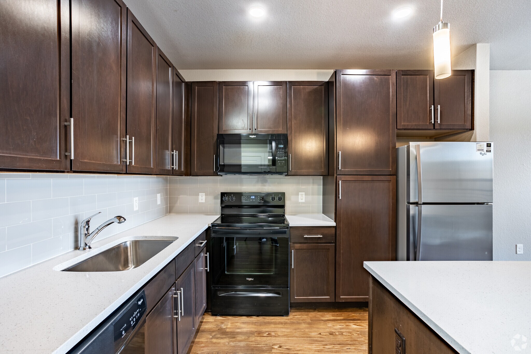 1BR, 1BA - 690SF - Jade - Kitchen - West 8th & Basecamp