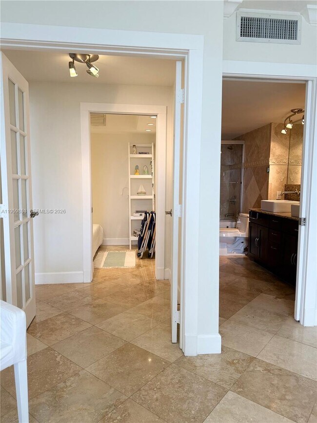 Building Photo - 3675 N Country Club Dr