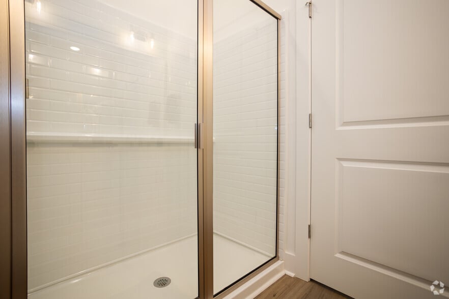 Meander - 2BR,2BA - 1,376SF - Primary Bathroom - River Rock at Dallas 55+ Active Adult Homes