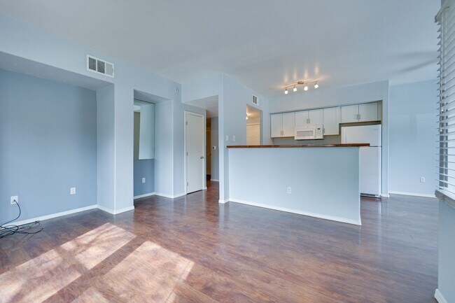 Building Photo - NW!! Gated!!! Clubhouse!!!Community Pool!!! 1st Floor Condo!!! Wood like floors!! No Carpet!!