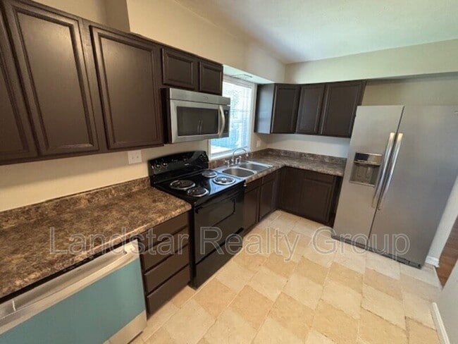 Building Photo - 6613 Manslick Rd