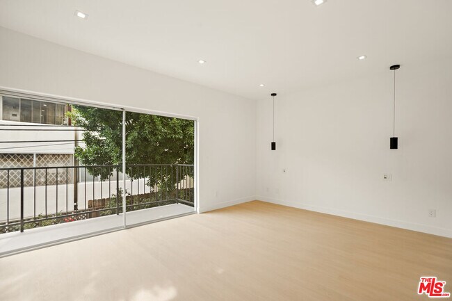 Building Photo - 10630 Wilkins Ave