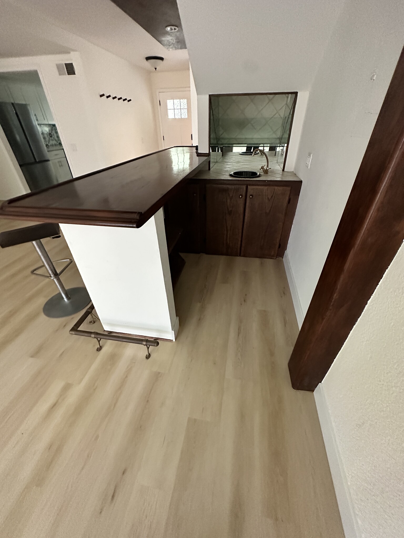 New floors behind the wet bar - 1833 11th St