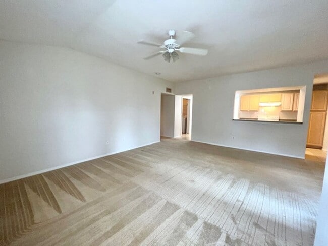 Building Photo - Move in NOW- Spacious 2 bedroom 1 bath condo on 3rd floor in gated community! Water included with...