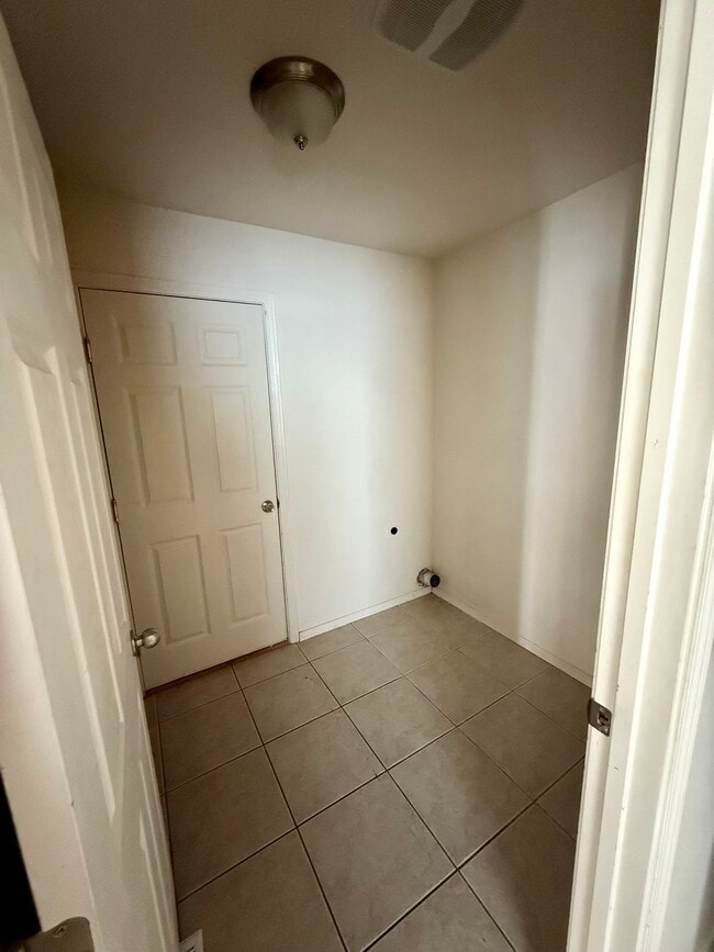 Laundry Room off of Kitchen - Leading to Garage - 440B Laguna Dr