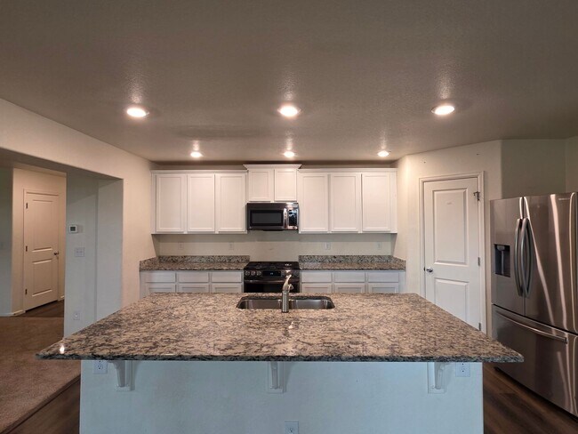 Building Photo - MASSIVE 5 Bedroom Home In Bennett!