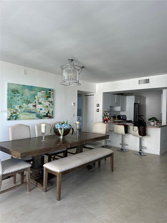 Building Photo - 3675 N Country Club Dr