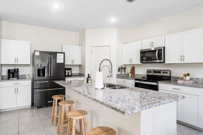 Building Photo - 9520 W Albeniz Pl