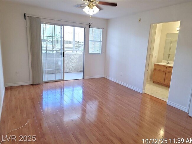 Building Photo - Inviting Green Valley Condo with Dual Balc...
