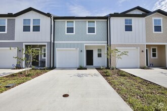 Building Photo - Brand New 3/2.5 Modern Townhome with 1 Car...