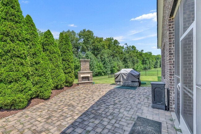 Building Photo - Beautifully maintained and move-in ready, this stunning mostly one-level all-brick home