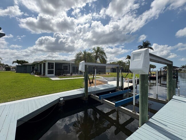 Building Photo - Beautifully Furnished Pool Home with Boat ...