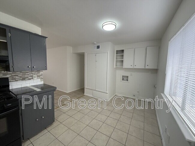 Building Photo - 1418 S 73rd E Ave