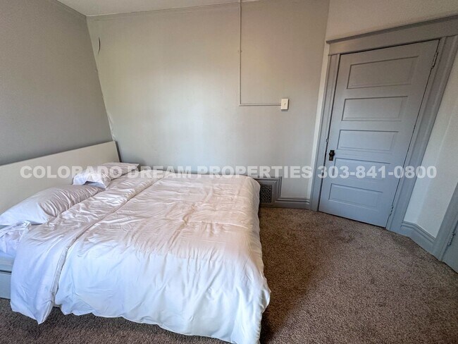 Building Photo - A home where old-world charm meets modern sophistication!