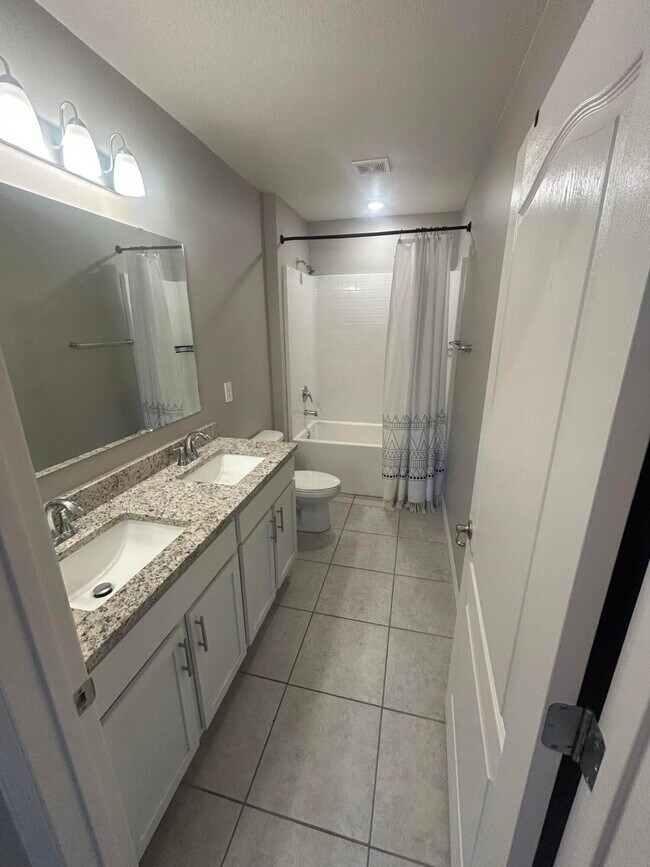 Building Photo - 5840 NW Bates Ave