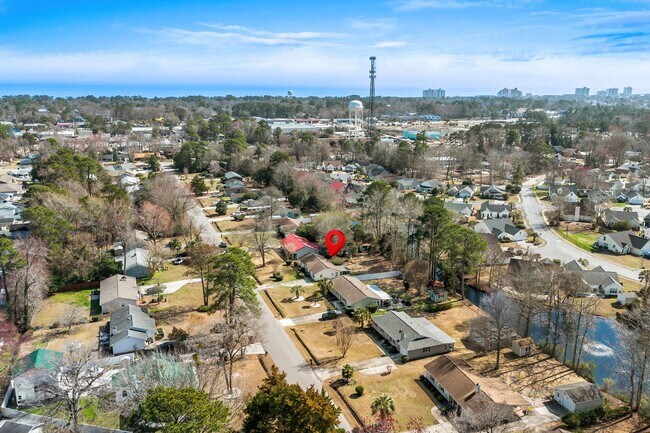 Building Photo - 4 Bed/2 Bath Furnished Single Family Home in Surfside 1 Mile to the Beach By Golf Cart!