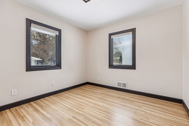 Building Photo - Gorgeous Like New Remodeled Edina Beauty with Gourmet Kitchen, Hardwood Floors & 2-Car Garage!