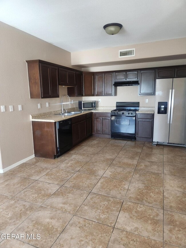 Building Photo - 14312 Pancho Gonzalez Ct