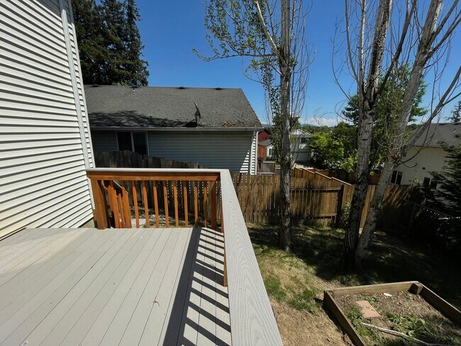 Building Photo - Spacious 4-Bedroom, 2.5-Bath Home with Deck, Fireplace & Updated Kitchen