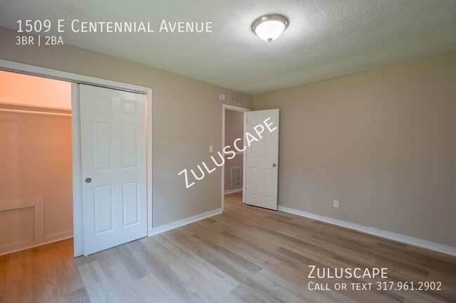 Building Photo - 1509 E Centennial Ave