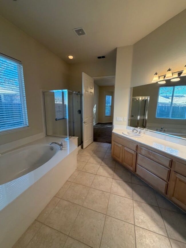 Building Photo - Beautiful 2 Bedroom and 2 Bathroom Home with 3 Car Garage in 55+ Gated Community $2,795.00