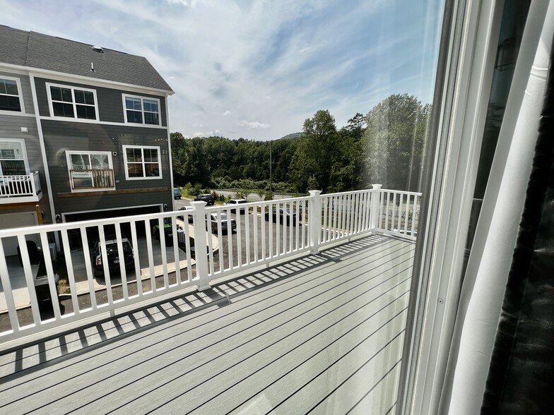 Rear deck off main living level - 2215 Swallowtail Ln