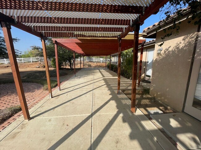 Building Photo - Spacious 4-Bedroom Home in Desirable Woodc...