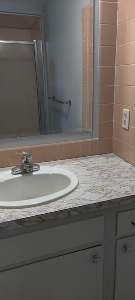 Bathroom Vanity & Mirror - 2514 Girard Ave S