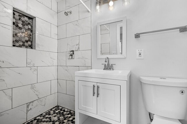 Building Photo - Beautifully Renovated 3 Bedroom 2.5 Bathroom Rental with study in McElderry Park VOUCHER Holders ...