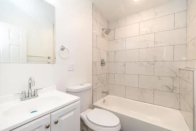 Building Photo - Brand New 4 Bedroom / 3.5 Bathroom Townhom...