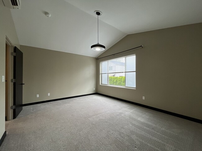 Building Photo - Charming 3 Bedroom, 2.5 Bathroom Home with Large Living Room, Tall Windows, Island Kitchen, and A...