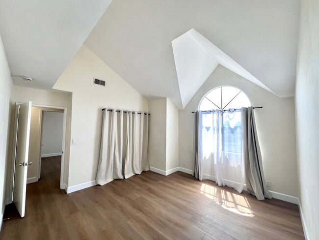 Primary bedroom with vaulted ceilings, ensuite bath and beautiful views. - 3161 Weldon Ave