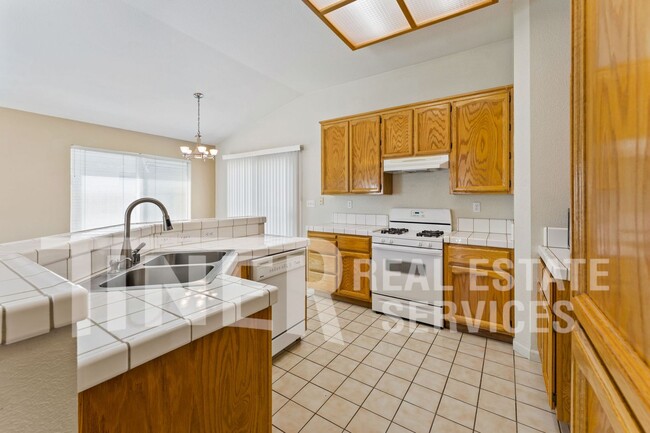 Building Photo - 8560 Harvest House Way