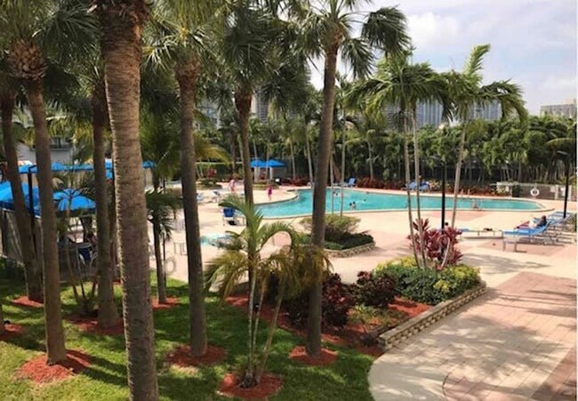 Building Photo - 19370 Collins Ave