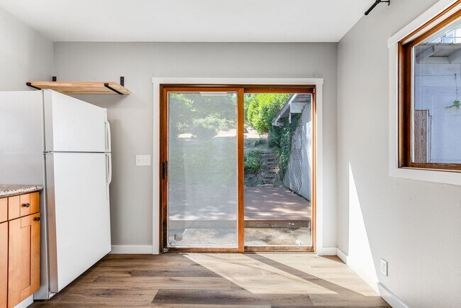 Building Photo - Charming 1 BD 1 BA cottage nestled on a be...