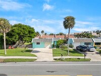 Building Photo - Beachside Living!
