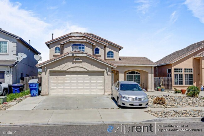 Building Photo - 5 br, 3 bath House - 1003 Sun Meadow Drive...