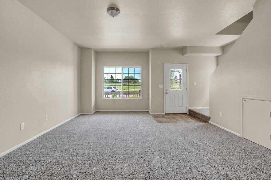 Building Photo - Modern Townhome with Central A/C, 2-Car Ga...