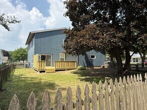 Building Photo - August 15th rent special! New deck! 3 Bedroom, updated kitchen, updated flooring, garage, drivewa...