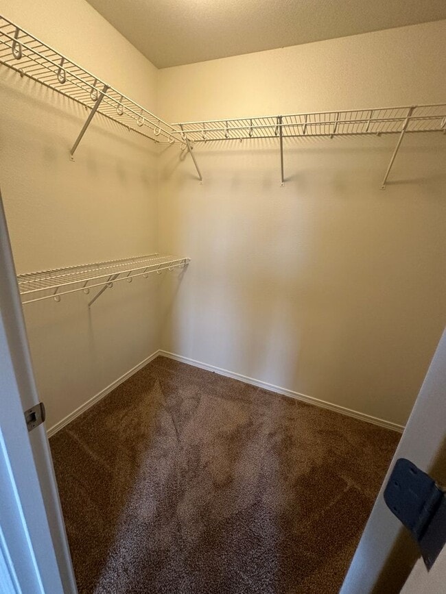 Building Photo - MOVE IN SPECIAL! Spacious 2 bed/2.5 bath with bonus room townhome off Road 68