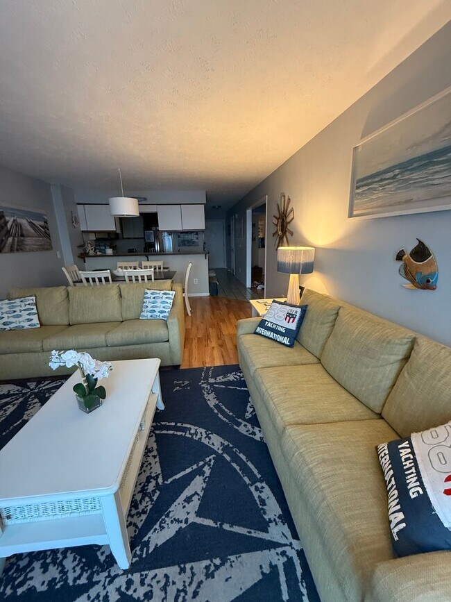 Building Photo - NEW OWNERS OF THIS FURNSIHED OFF-SEASON RE...