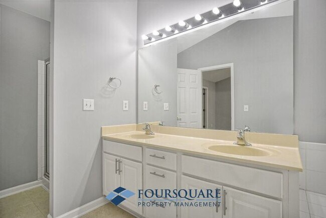 Building Photo - Lakefront Townhome with 1st Floor Bedroom, Fireplace & 2-Car Garage – In Raleigh