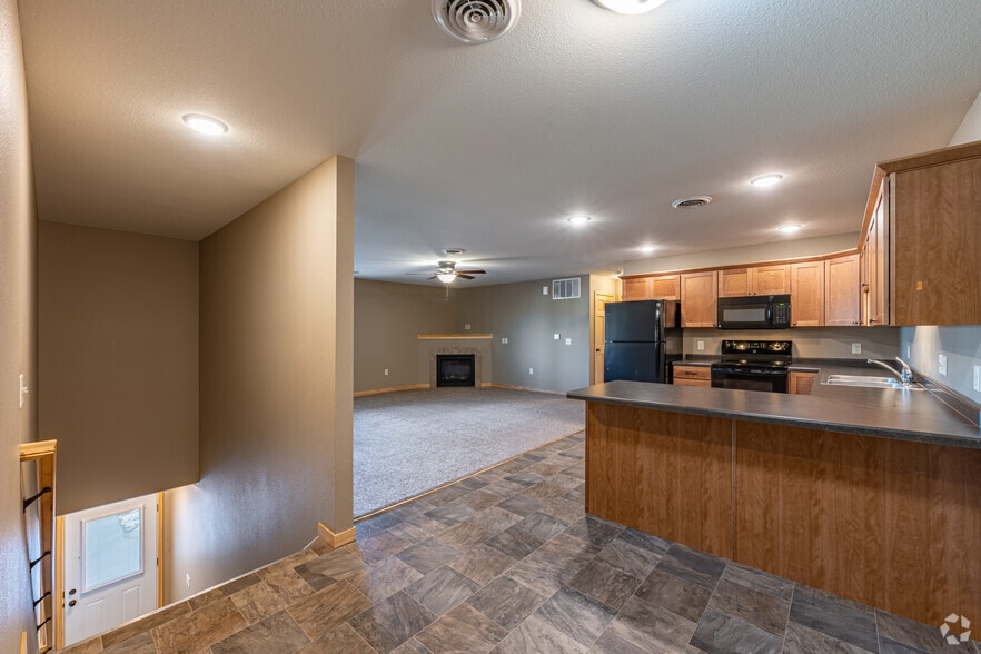 2BR, 2BA - 1,400SF - Kitchen/Living Room/Entry - Welcome to Wissota Shores – Tranquil Lakeside Living in Chippewa Falls