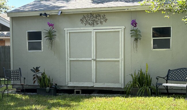 She shed in backyard for extra hangout space - 229 Summerwood Trail